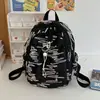 Mochila Escolar de Moda Transfronteriza de Alto Valor para Estudiantes de Primaria y Secundaria Diseño de Nicho Simple Mochila Versátil