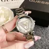 Reloj de Cristal Rombo Personalizado al por Mayor Moda Simple Triángulo Invertido Gues Reloj para Mujer Estudiante Reloj de Cuarzo