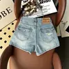 Shorts de Mezclilla Rasgados con Dobladillo Crudo Estilo Retro Americano para Mujer, Adelgazantes, Versátiles, de Chica Atrevida, de Moda 2026, Pantalones Elegantes, de Moda