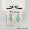 Brincos anel gota de óleo flor borboleta cor ouro 18k banhados a cobre design de nicho brincos transfronteiriços europeus e americanos mulheres atacado
