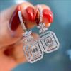 Pendientes largos de mujer con diseño de Cao Shi Shake Voice Live y microincrustaciones de diamantes y circonitas con lazo de hada.