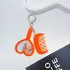 Pingente de Espelho em Acrílico com Coração que Muda de Cor, Acessório de Bolsa Simples e Versátil, Chaveiro Pente de Alça Portátil