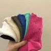 Mismo estilo que Xiaohongshu calcetines rotos de mendigo para mujer moda ins marca High Street estilo celebridad de internet calcetines de punto gruesos rotos de media pantorrilla