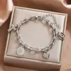 Pulsera Pulsera de Acero Inoxidable en Forma de U con Colgante Múltiple Corazón Cabeza Cruzada Nueva Belleza Cruzada Europea y Americana