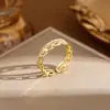 Anillo moda femenina personalidad acero de titanio no se decolora Joker lujo ligero doble capa anillo abierto alto sentido fabricantes venta al por mayor