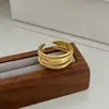 Viento frío anillo explosión plata de ley S925 hueco ins alto sentido nicho diseño abierto joyería índice mayorista