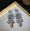 Pendientes con borlas de diamantes de imitación exagerados, estilo europeo y americano, diseño de nicho femenino, sensación avanzada, únicos y distintivos, nuevo estilo 2025