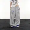 Pantalones de chándal estampados patchwork retro americano 2026 para hombre y mujer, corte ajustado hip-hop deportivo casual para pareja, pantalones de pierna ancha de moda