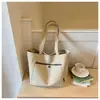 Bolsas de mujer transfronterizas al por mayor, bolsos grandes de lona nuevos, bolsos tote grandes de capacidad simple casual para mujer, bolsos de hombro simples, modernos