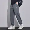 Pantalones deportivos casuales rectos holgados de otoño para jóvenes, pantalones largos deportivos versátiles, pantalones jogger casuales de secado rápido para hombre
