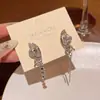 Pendientes de Lazos Microincrustados de Circonita de Venta Caliente Estilo Coreano 2026 para Mujer, Aguja de Plata S925, Pendientes de Perla de Botón de Gama Alta Nicho