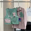 Estilo Montanha Esportes ao Ar Livre e Lazer Bolso Conjunto de Duas Peças Dopamina Camisa Solta 9290