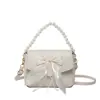 Bolsa de Hombro Cruzada Versátil Estilo Ins con Textura y Cadena de Perlas, Diseño de Lazo de Comercio Exterior, Bolsa para Viajar