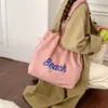 Bolsa de ombro única de camurça nicho nova bordada para o dia a dia, bolsa de mão de camurça feminina moda, simples inverno 2026 grande capacidade