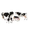 Set de 4 Figuras de Animales de Granja  Figuras Realistas de Vaca Negra Blanca y Ternero Modelos de PVC para Juguetes Educativos y Decoraciones para Niños y Coll