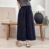 Pantalones de pierna ancha con costuras de encaje de diseño para mujer, pantalones cortos finos de verano, holgados, cintura elástica, cubren la carne, pantalones tipo falda ajustados, venta al por mayor