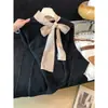 Tiro real suéter de punto con lazo retro francés invierno mangas de campana estilo perezoso dobladillo irregular capa interior camisa base