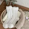 Calcetines con borde de encaje para mujer, calcetines de media pantorrilla para otoño e invierno, calcetines dulces y versátiles estilo Miu con volantes, calcetines de algodón transpirables y absorbentes de sudor para mujer
