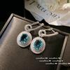 Gabriel Green Park Brincos de gema Xinghe brilhante chapeado 18K ouro pavão luz verde Zircon anel conjunto