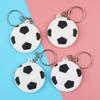Regalo conmemorativo deportivo llavero de fútbol de doble cara tridimensional de pegamento flexible personalidad pequeño artículo llavero colgante de cuerda de cuero