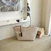 Bolso tote de tejido francés para mujer 2026 nuevo bolso de mano de gran capacidad para vacaciones de verano, bolso de hombro único para ir al trabajo, bolso de axila
