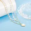 Collar de perlas en forma de corazón de doble capa para mujer, con un diseño lujoso y sofisticado, un estilo único y moderno, y un popular collar de cadena para la clavícula, nuevo para 2022