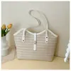 Bolso de hombro de gran capacidad para vacaciones en la playa de comercio exterior, bolso simple y moderno para debajo del brazo, bolso tote de alta gama tejido a mano