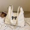 Bolso de mano de gran capacidad para mujer, mochila multifunción de alta gama de verano 2024, mochila para estudiantes universitarios.