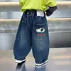 Pantalones Vaqueros de Primavera y Otoño para Niños Pi Shuai 2026 Estilo Nuevo Pantalones Largos Sueltos para Bebé Pantalones con Estilo Callejero para Niño Pequeño Pantalones para Niños