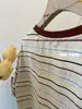 Camiseta de Manga Corta a Rayas de Color Contrastante para Mujer, Nuevo Estilo Verano 2026, Corte Holgado, Adelgazante, Diseño Único, Top de Algodón Puro