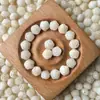 Raíz de Bodhi Natural Tallada Flor Flotante de Camelia Flor de Rosa Doble Cara Accesorios de Joyería DIY Material para Abalorios Al por Mayor