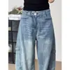 Diseño de comercio transfronterizo jeans de pierna ancha para mujer de principios de primavera, pantalones rotos, hasta el suelo, corte curvo, adelgazantes de primavera, corte holgado, estilo americano