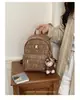 Mochila Feminina Retrô de Luxo 2026 Nova Versátil para o Dia a Dia Exquisite Super Popular Grande Capacidade Pequena Mochila Escolar
