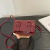 Bolsa pequena estilo coreano 2026 nova bolsa de ombro de outono, bolsa quadrada pequena simples e de alta qualidade, bolsa transversal casual debaixo do braço