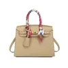 Bolsa Feminina 2026 Nova Tendência de Moda Bolsa Tote Casual Bolsa de Ombro Transversal Bolsa Quadrada Pequena Simples para o Dia a Dia