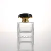 Botella de perfume ovalada nueva de 30 ml con tapa de presión, conveniente para llevar, botella de dispensador por presión, botella de spray de perfume de vidrio transparente