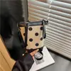 Bolso Cubo Mini de Diseño de Nicho Transfronterizo con Lunares Verano 2026 Nuevo Bolso de Almacenamiento para Viajes Diarios Bolso de Hombro Cruzado
