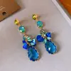 Borlas Florales de ColoresAretes colgantes con borla de lágrima tachonada de diamantes, un toque de lujo y sofisticación, aretes elegantes y a la moda para mujer