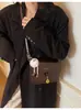 Bolso pequeño cuadrado texturizado de color liso clásico para mujer, nuevo 2026 otoño e invierno, versátil, de moda, para ir al trabajo, de hombro y cruzado