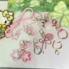 Colección de Accesorios Llavero Frijol Pin Adornos Colgantes Set Completo Paquete de Materiales diy Anillas de Resorte Argollas Abiertas Dijes para Bolsos