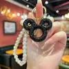 Llavero de Cabeza de Mickey Hueca con Diamantes Completos y Cadena de Perlas Estilo Europeo y Americano, Colgante Decorativo de Bolso de Moda y Versátil para Niñas