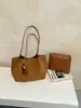 Bolso de Hombro Grande de Capacidad Retro para Viajes Transfronterizos Otoño/Invierno 2026 Nuevo Bolso de Mano Casual Simple Bolso para Madre e Hijo
