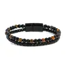 Pulsera de cuero de aleación para hombre, nueva pulsera de piedra natural con cuentas de ojo de tigre y piedra volcánica, de estilo europeo y americano. Fabricantes.