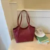 Bolsa de tecido de luxo leve de nicho de alta qualidade feminina 2026 nova bolsa tote de verão para o trabalho bolsa de ombro única de grande capacidade