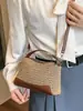 Shuai Mi Jia 2026 Verano Nuevo Bolso Cruzado Simple de un Solo Hombro Bolso de Paja Vintage Moda de Nicho Bolso Tejido