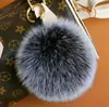Pelota de imitación de pelo de producción, pelota de pelo falso, pelota de imitación de pelo de zorro, adornos para llaves, colgante de bola de imitación de conejo Rex, colgante de bola de pelo artificial