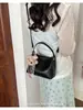 Bolso de mano y bolso cruzado minimalista de color liso, bolso pequeño tipo cubo, nuevo bolso pequeño versátil de estilo coreano de moda 2026 para mujer