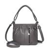 Venta al por mayor transfronteriza Bolso pequeño portátil Bolso de madre de cuero suave casual nuevo para mujer Bolso de hombro cruzado Bolso tipo cubo