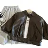 Chaqueta de cuero elegante para niños Muye, chaqueta de otoño para motocicleta, abrigo retro versátil de estilo coreano para niños, ropa infantil Huzhou Zhili