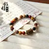 Novo bracelete de sândalo com múltiplas contas em estilo chinês com vários acessórios de madeira maciça e jade Bodhi, pulseira de mão colecionável, fornecimento no atacado para transmissões ao vivo